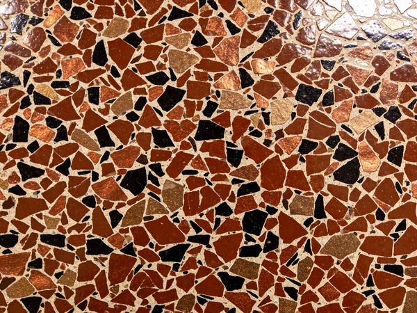 Close-up of the Copper Ember flake blend: Rust, bronze, black.